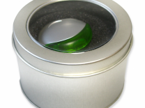 kulatá kovová krabička s průhledem